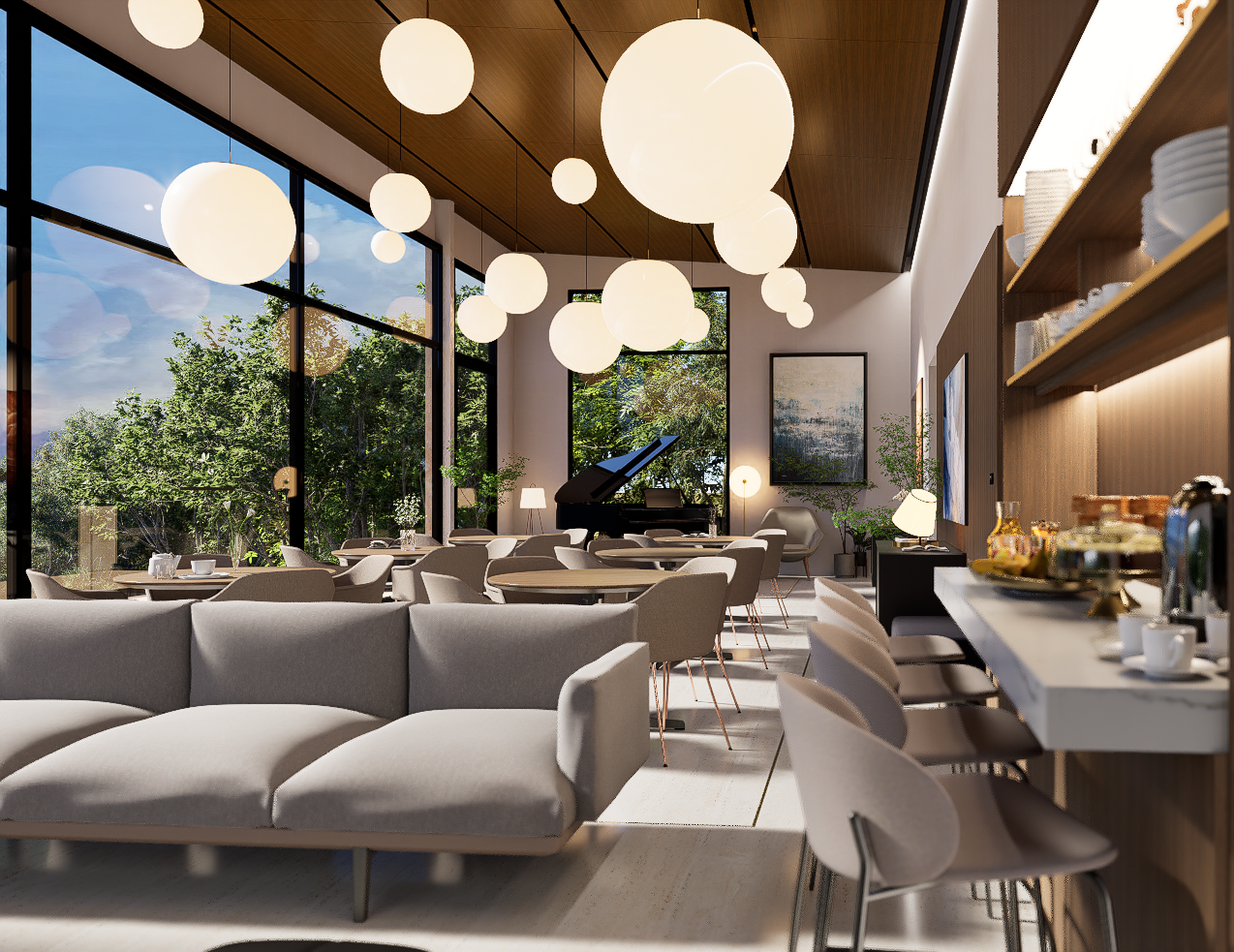 Sala de estar luminosa con sofá, mesas y ventanales hacia el jardín